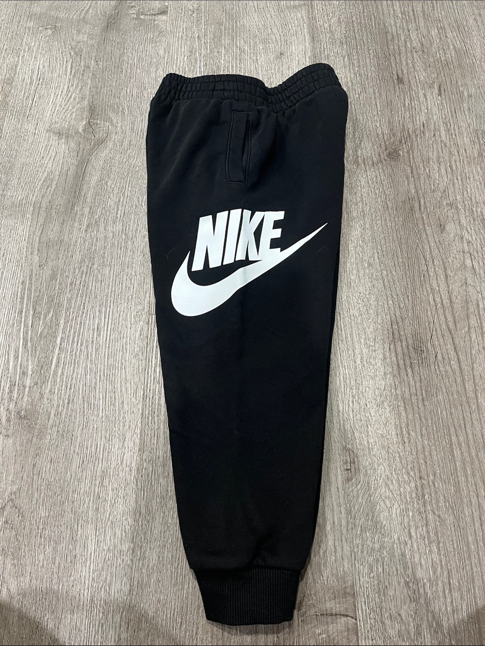 Nike Black Jogger Sweatpants with White Swoosh Logo